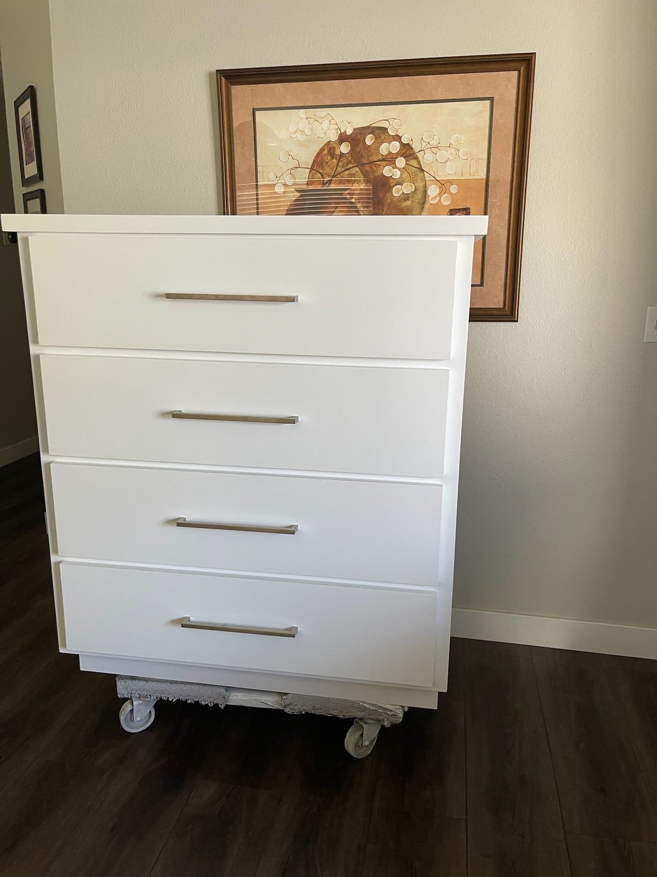 White four-drawer chest