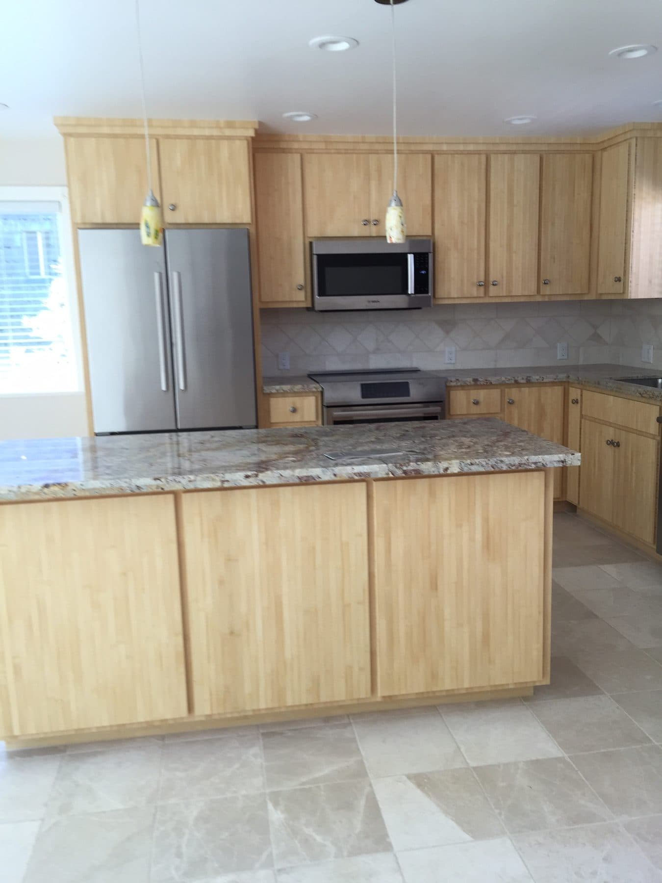Natural maple kitchen with granite island