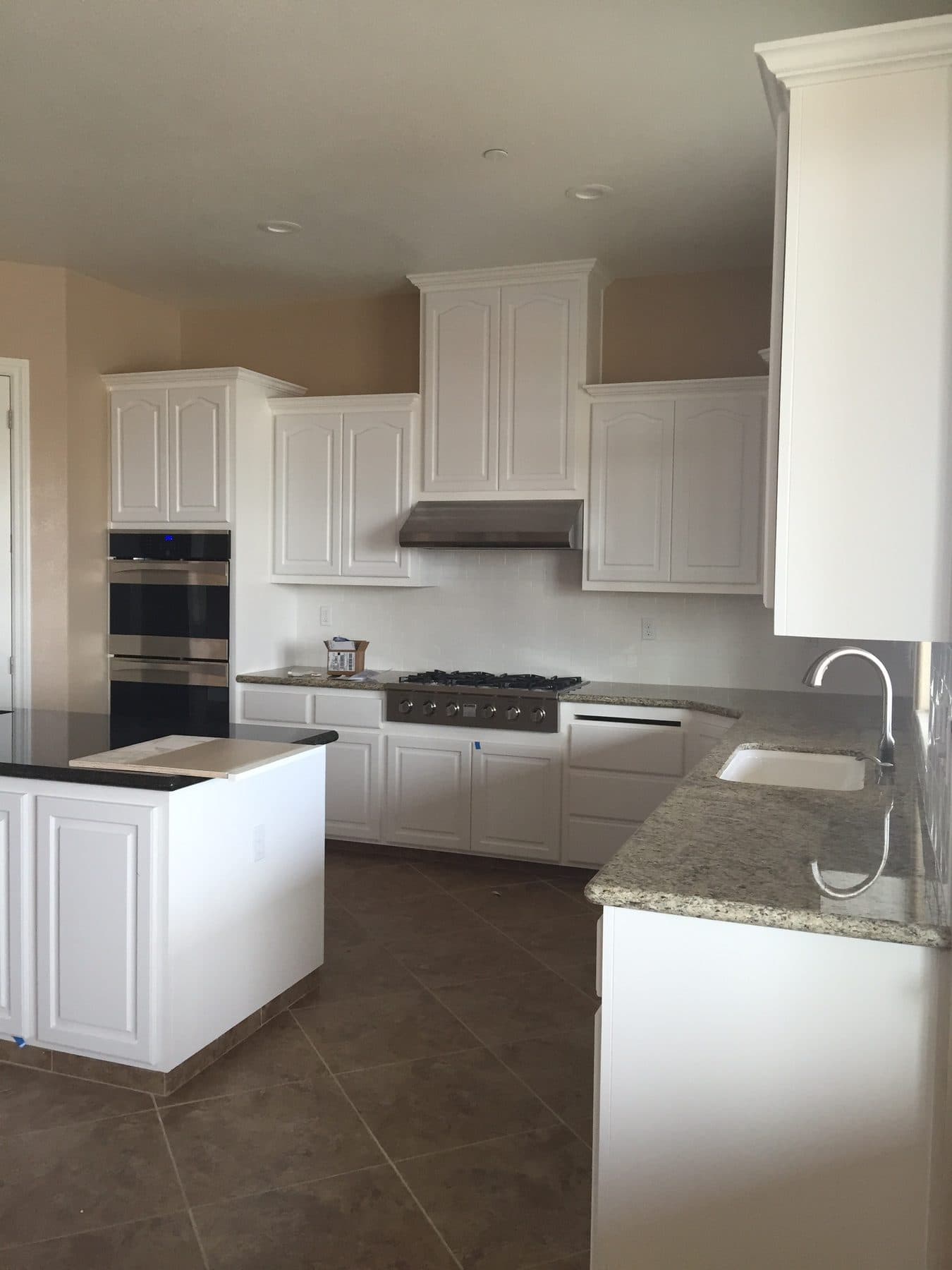 White kitchen with island