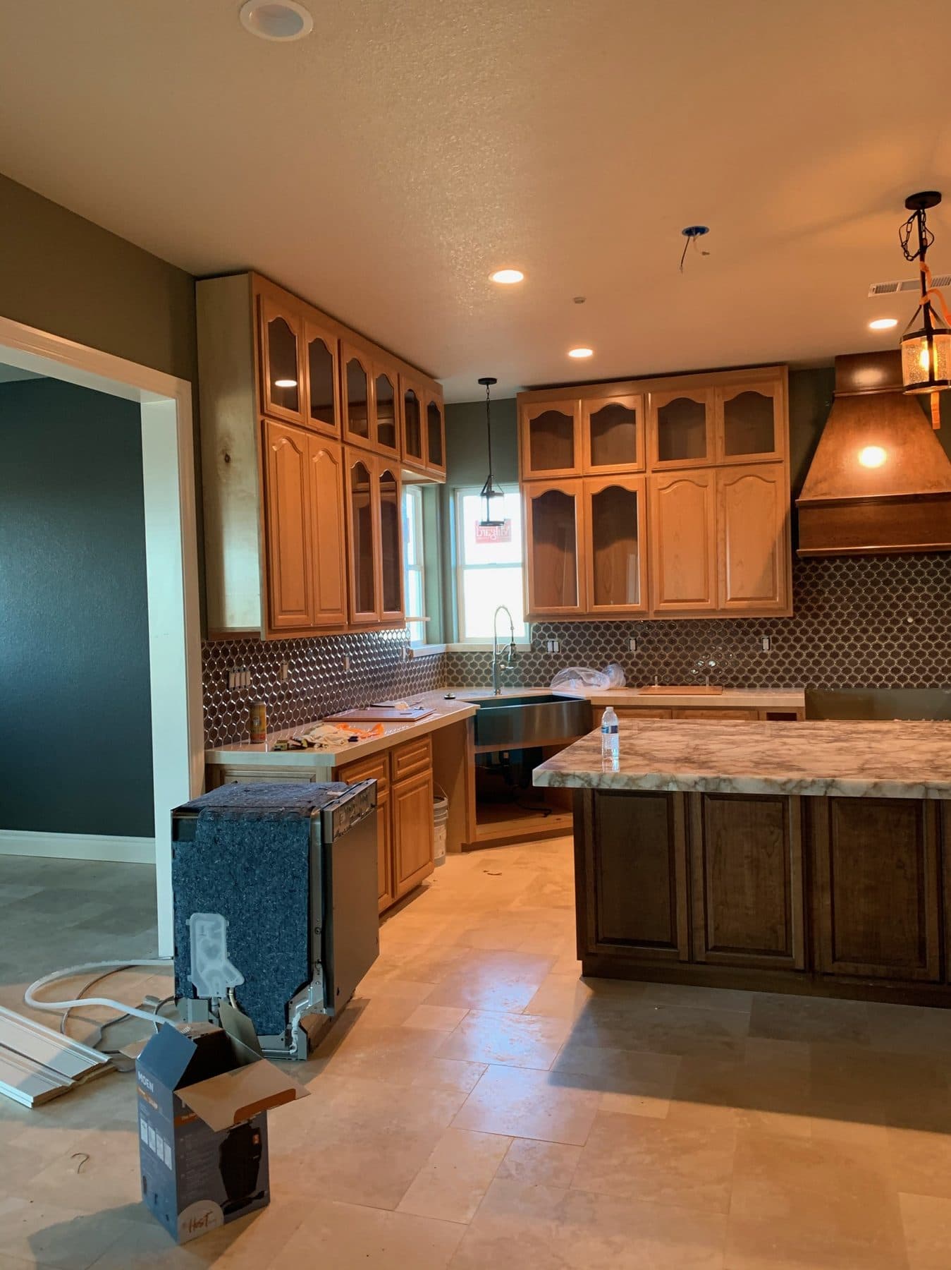 Oak kitchen with custom hood