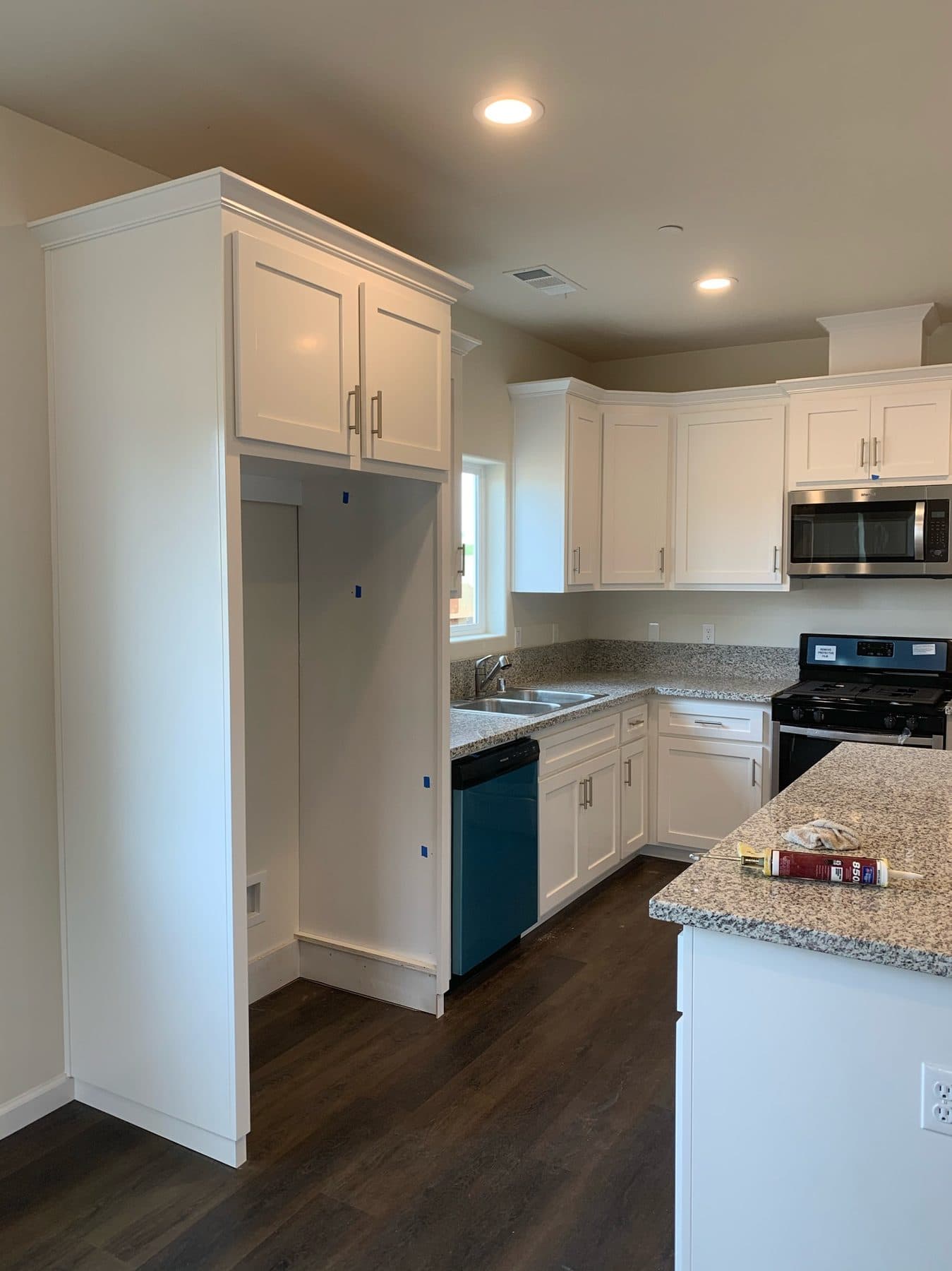 White shaker kitchen with island
