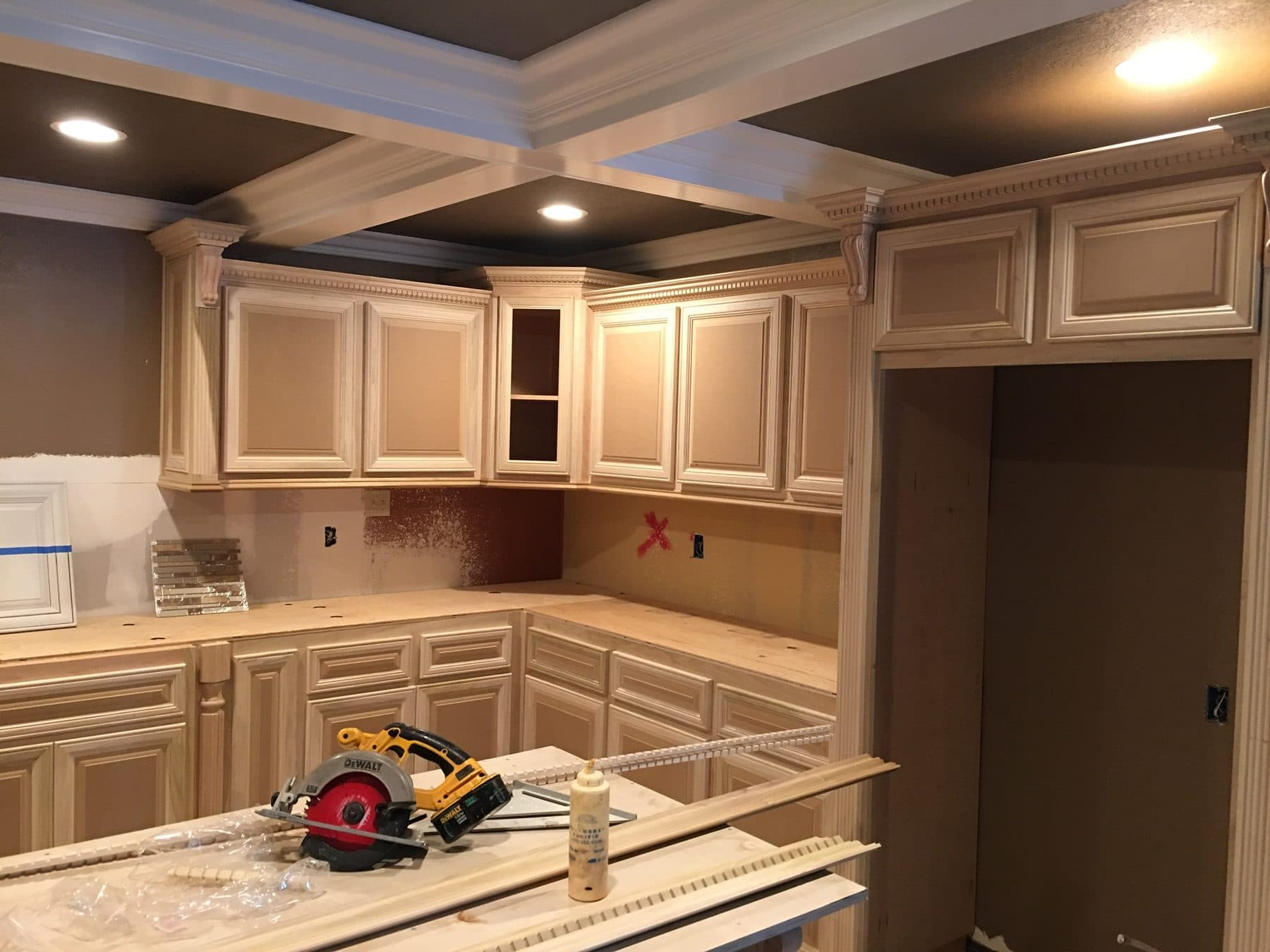 Cream kitchen with crown molding