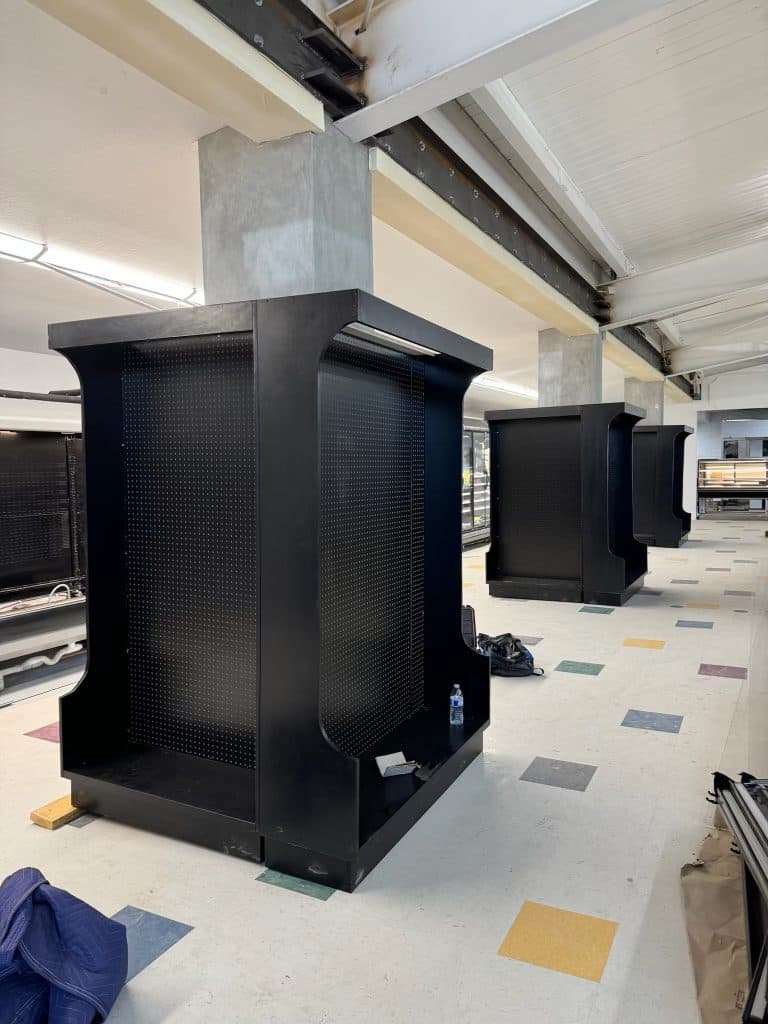 Double-sided pegboard gondolas