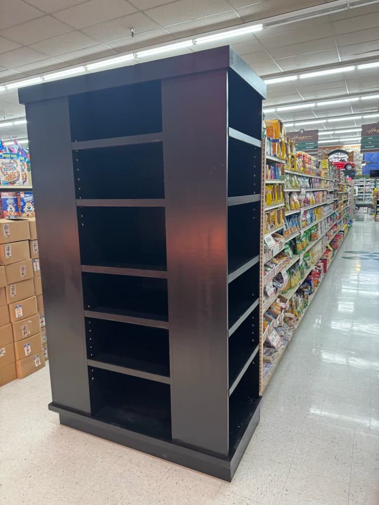 Tall black shelving unit